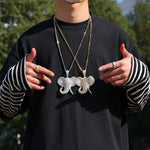 Two elephant pendant necklaces.