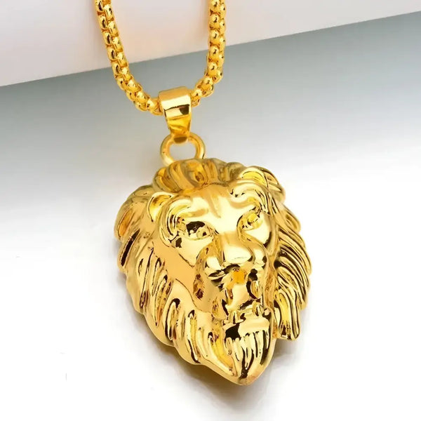 Gold lion head pendant necklace.