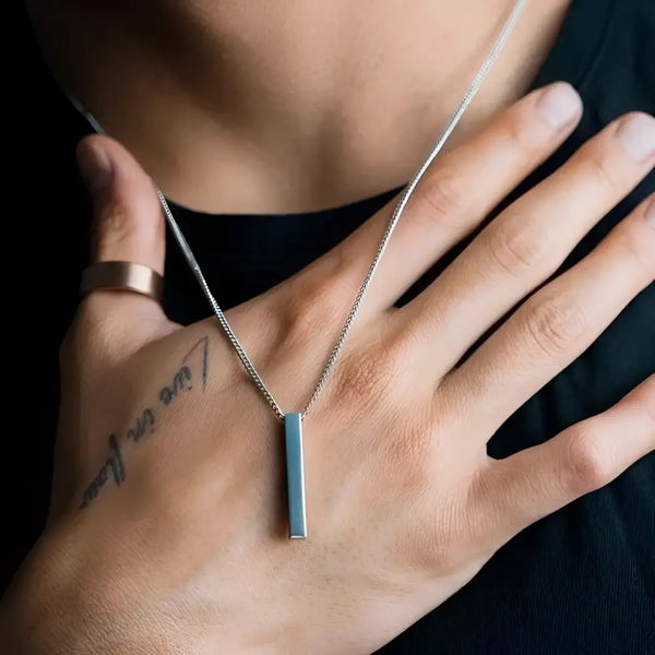 Silver bar pendant necklace.