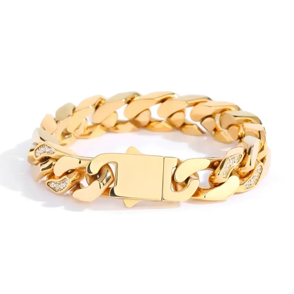 Gold chain-link bracelet with diamond accents.