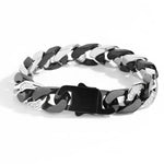 Two-tone chain link bracelet with crystal accents.