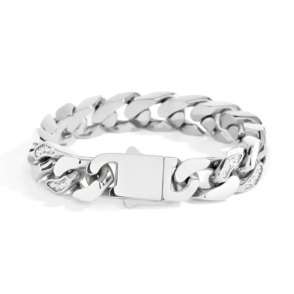 Silver chain-link bracelet with diamond accents.