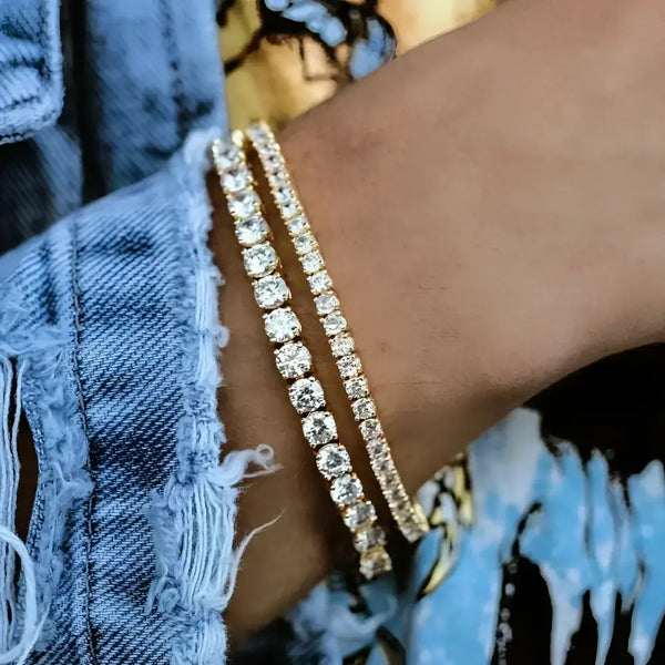 Two diamond tennis bracelets.