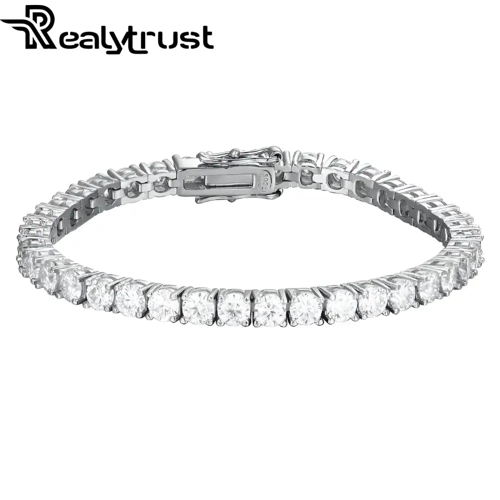 Silver tennis bracelet with round diamonds.