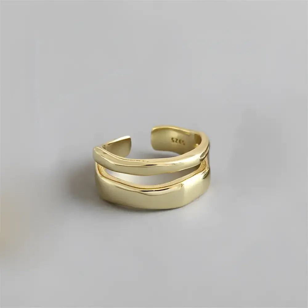 Gold-colored, double-banded, adjustable ring.