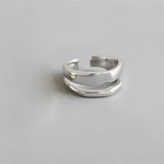 Silver double-band ring.