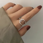 Silver interlocking circle ring.