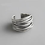 Oxidized silver multi-strand ring.