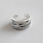 Silver braided adjustable ring.