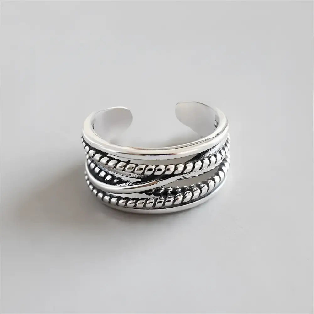 Silver braided adjustable ring.