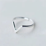 Silver chevron ring.