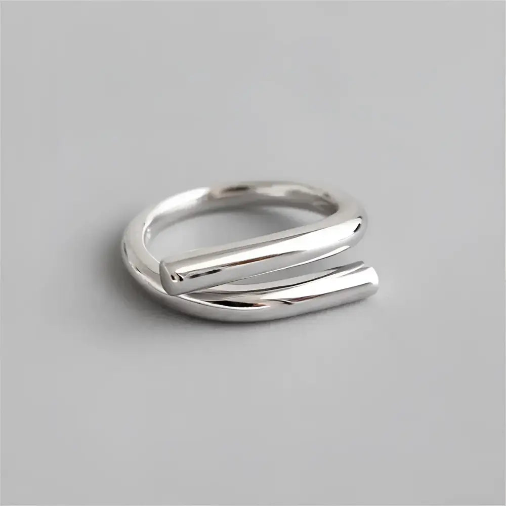 Silver double-band ring.