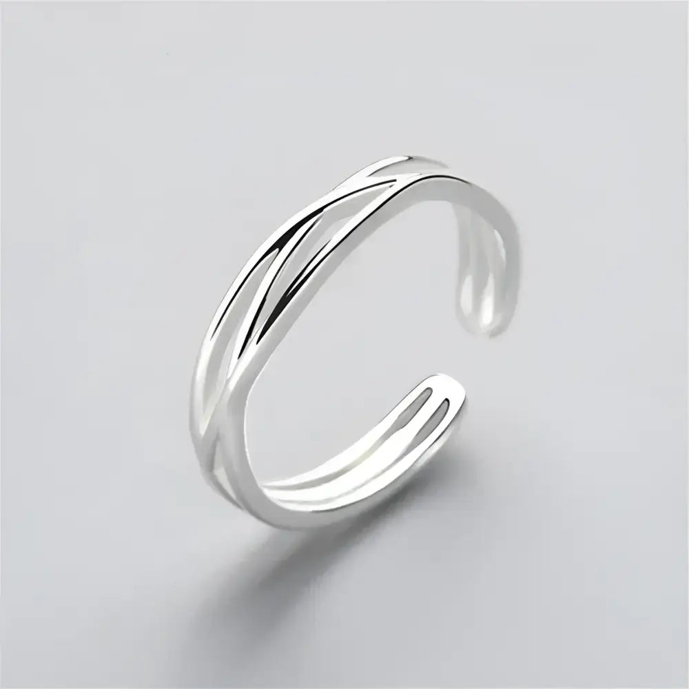 Silver criss-cross ring.