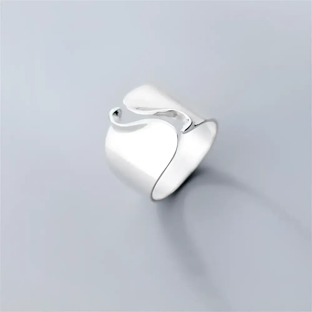 Silver statement ring.