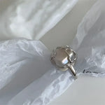 Silver ring with baroque pearl.