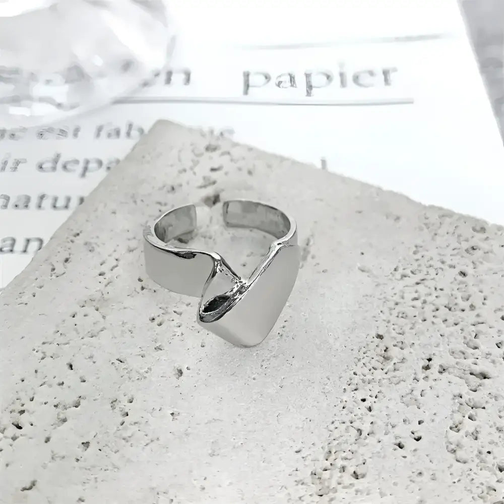 Silver adjustable ring.