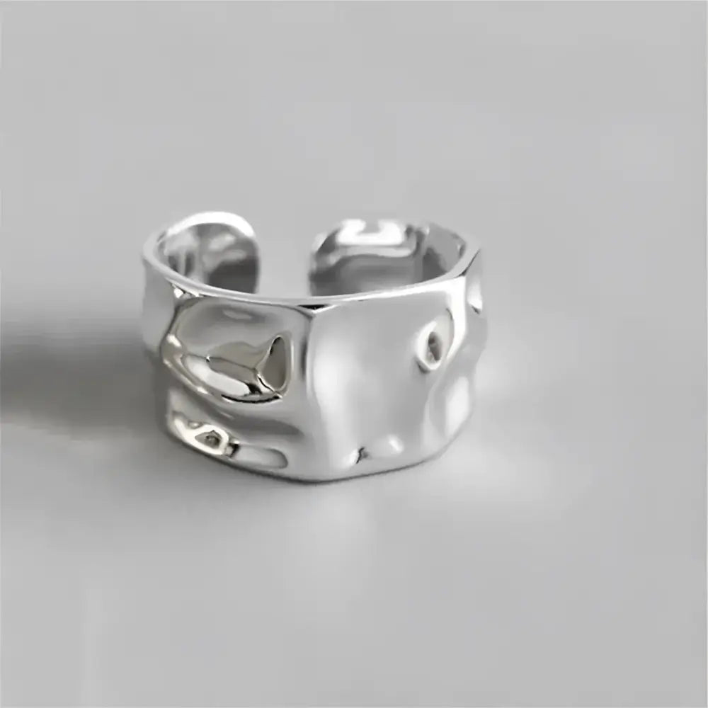 Silver textured ring.