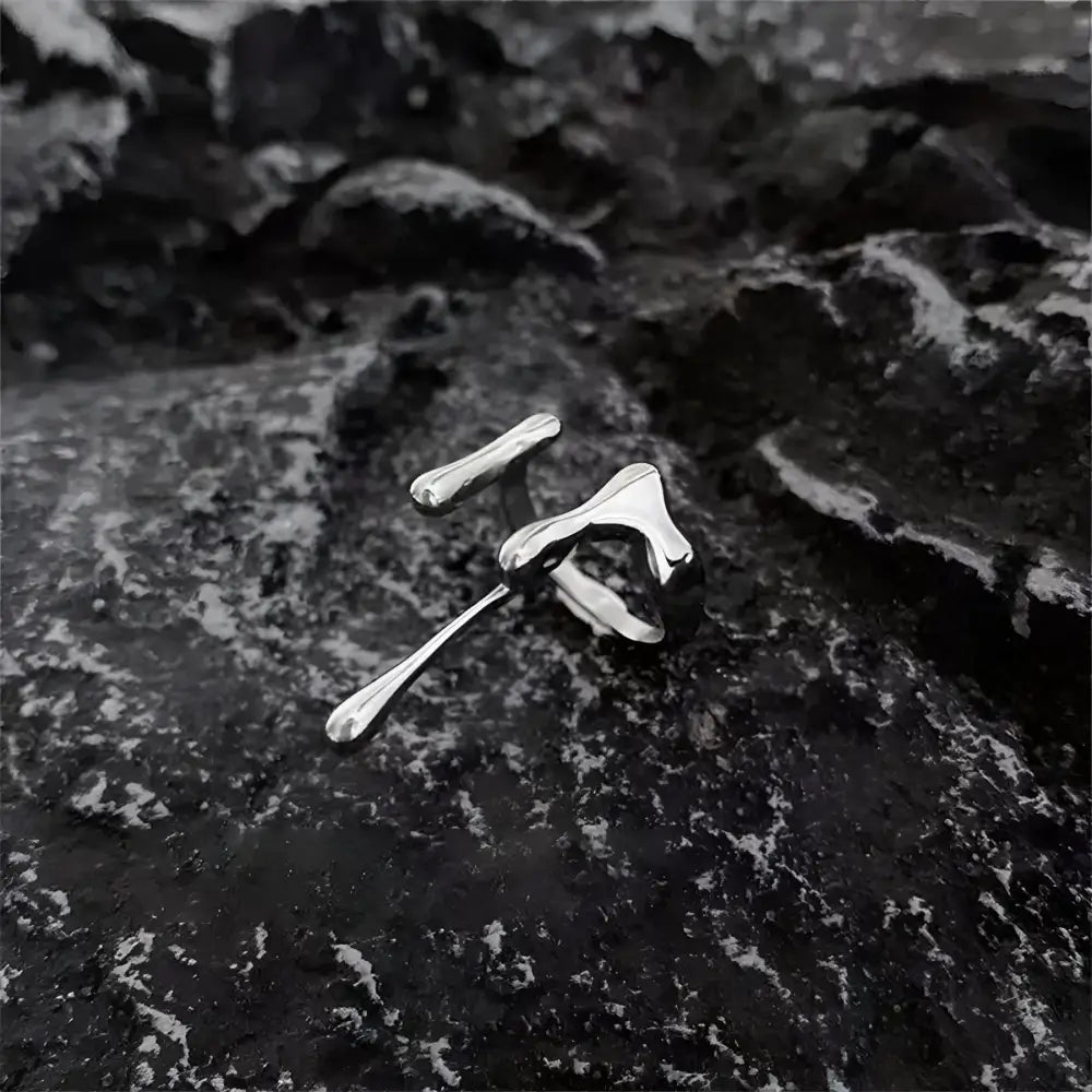 Silver abstract ring and ear cuff.