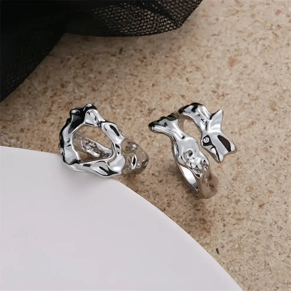 Two shiny silver rings.