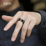 Black ring with gold accents.