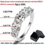 Silver ring with five zircon stones.