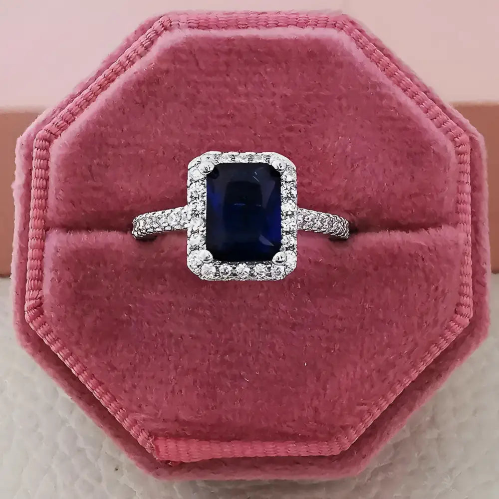 Sapphire and diamond halo ring.