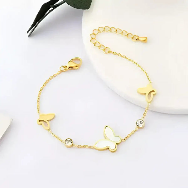 Gold butterfly charm bracelet.