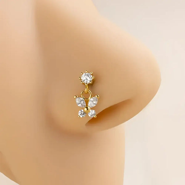 Gold butterfly nose ring.