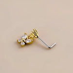Gold and silver butterfly nose ring.