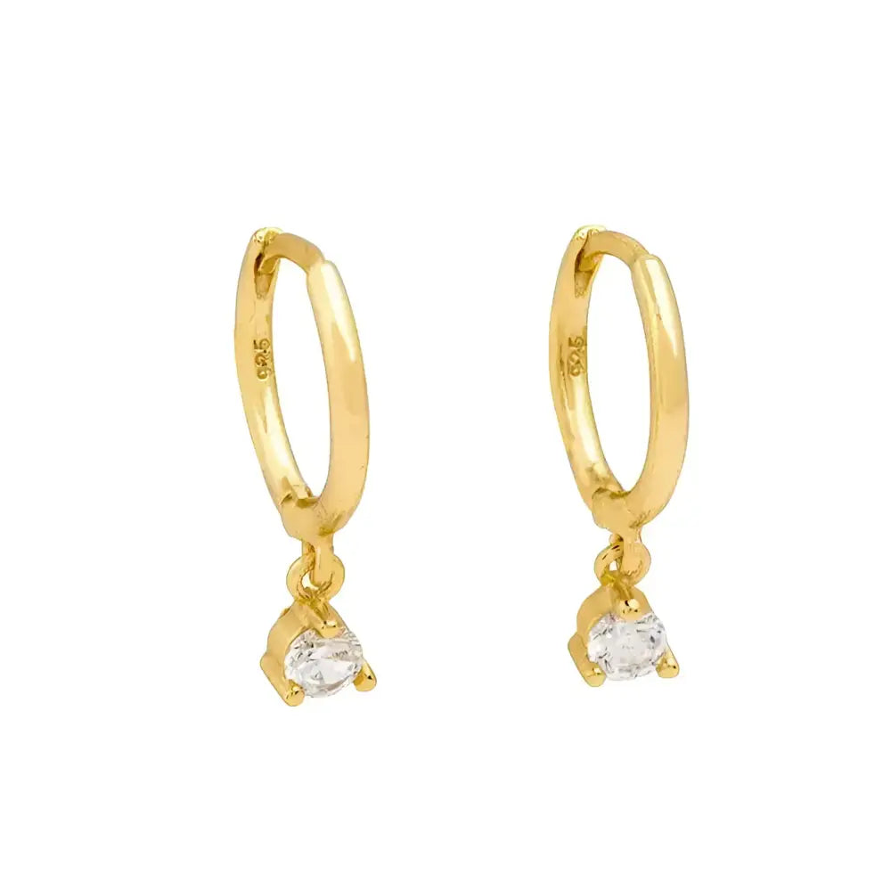 Pair of gold hoop earrings with teardrop gems.