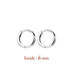 Pair of silver hoop earrings.