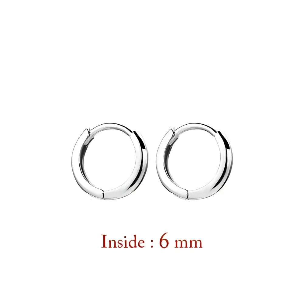 Pair of silver hoop earrings.