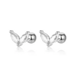 Two silver leaf-shaped stud earrings.