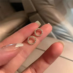 Circular crystal earrings.