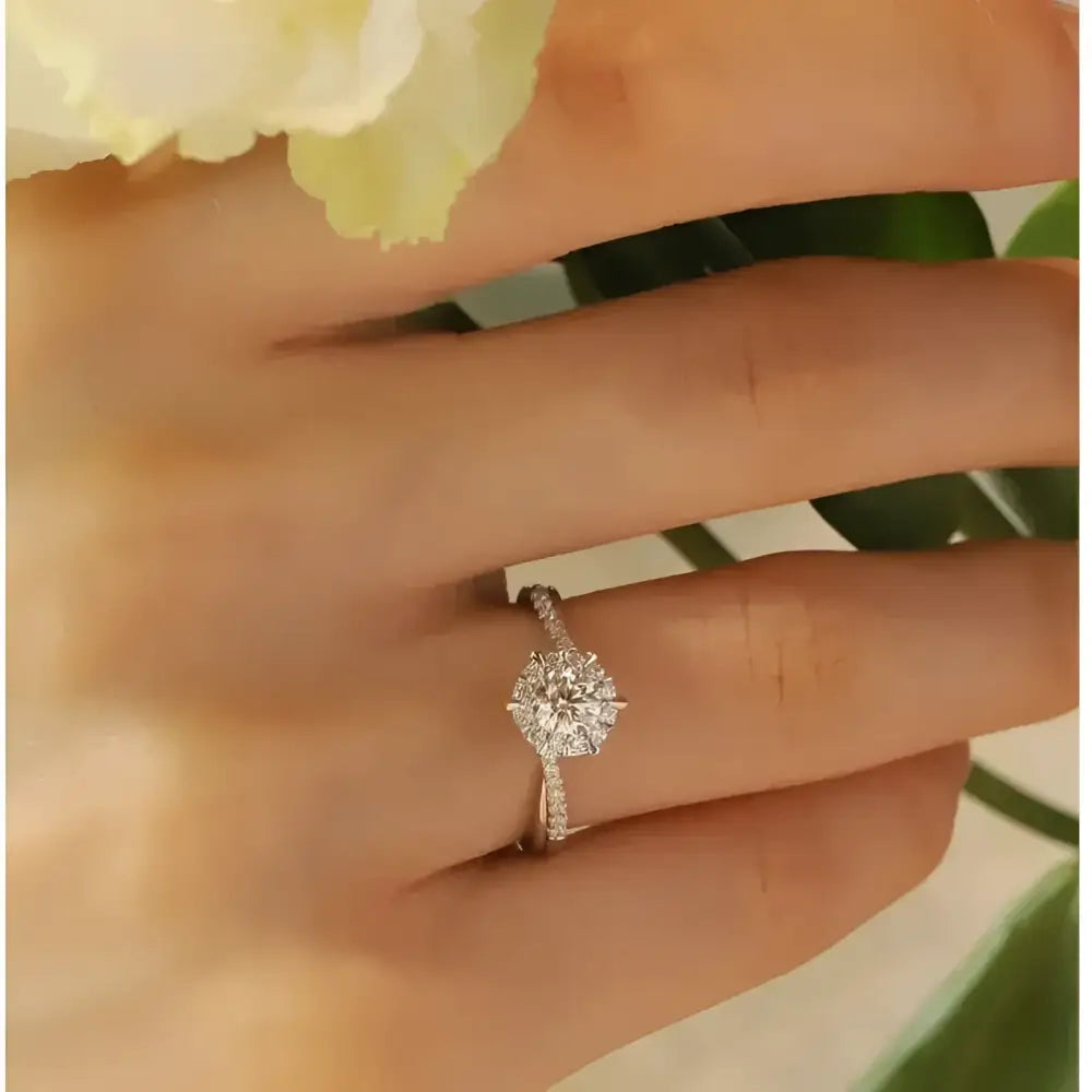 Diamond halo engagement ring.