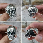 Silver skull ring.