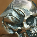 Silver skull ring.