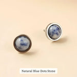 Round blue stone stud earrings.
