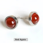 Red agate stud earrings.