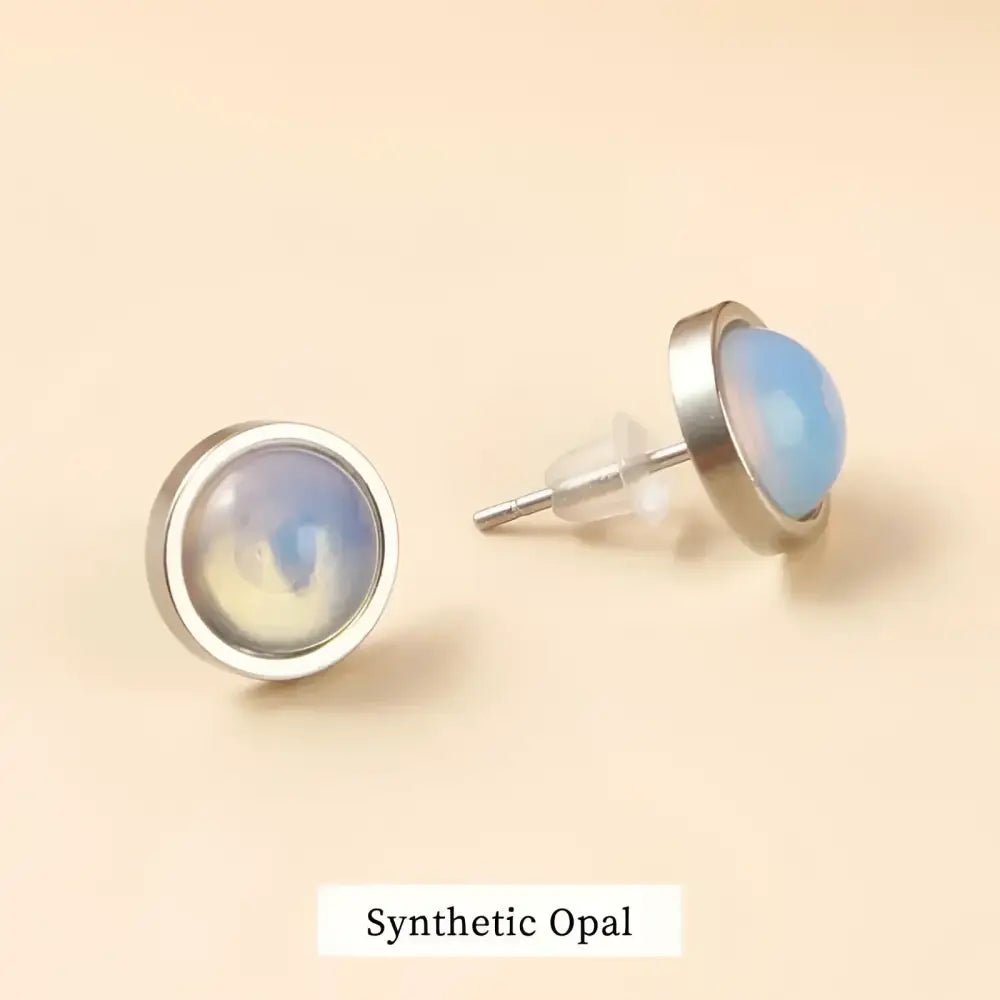 Synthetic opal stud earrings.