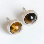 Tiger’s eye stud earrings.