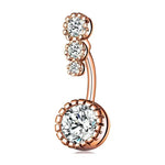 Rose gold belly button ring with clear gemstones.