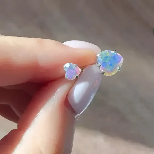 Iridescent heart-shaped earrings.