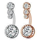 Two jeweled belly button rings.