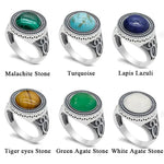 Silver rings with various gemstones.