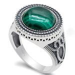 Silver ring with green malachite stone.