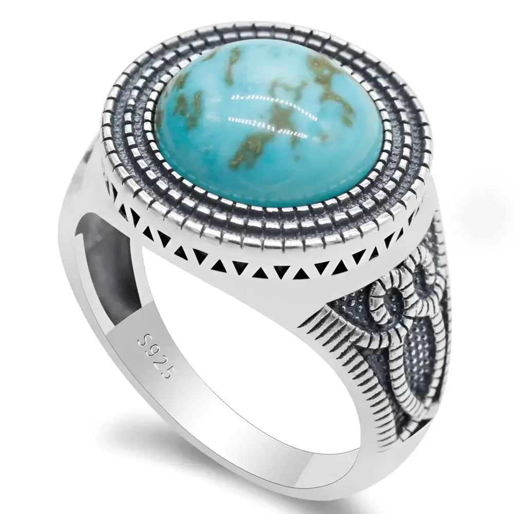 Silver ring with turquoise stone.