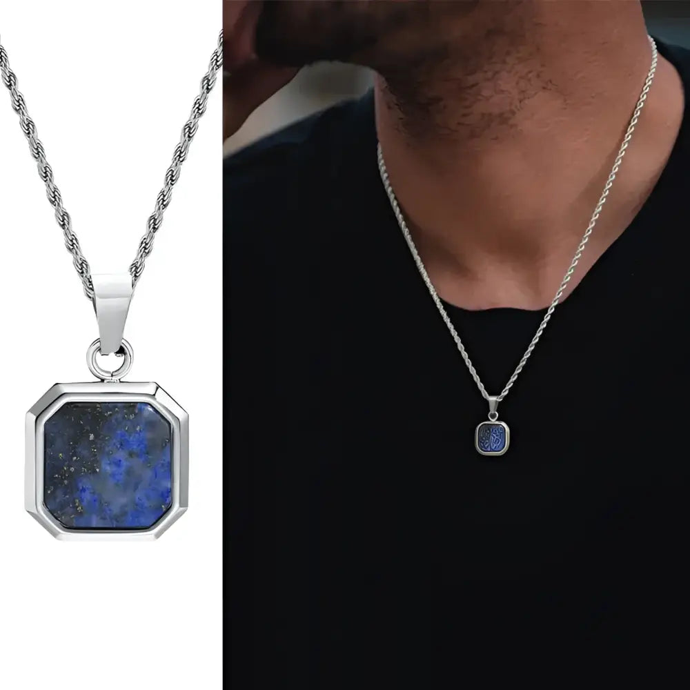 Silver necklace with blue stone pendant.