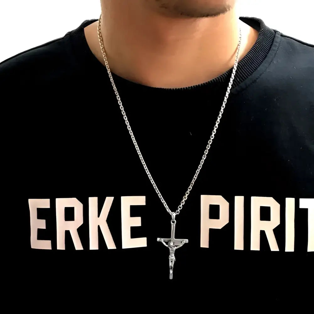 Silver crucifix pendant necklace.
