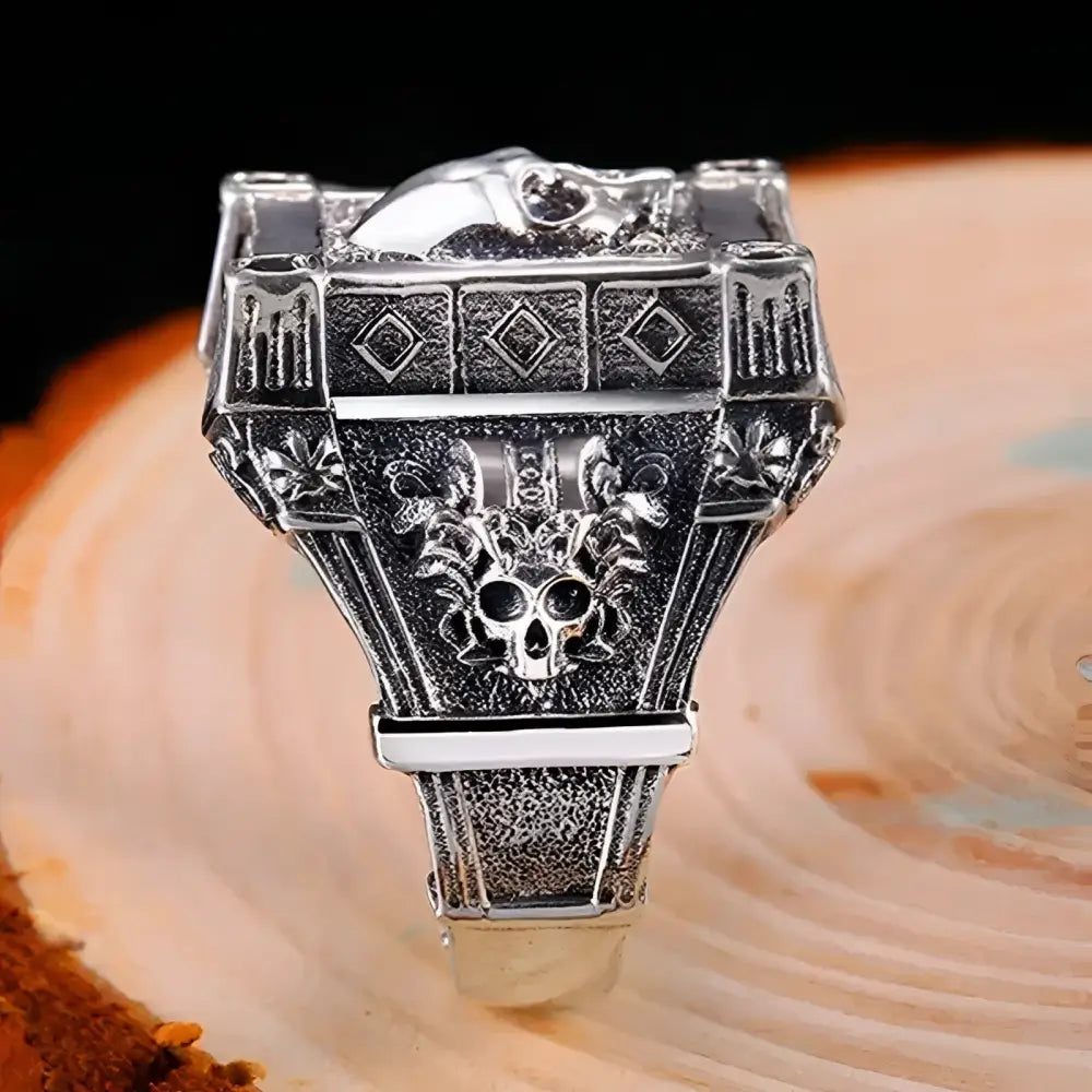 Silver skull ring.